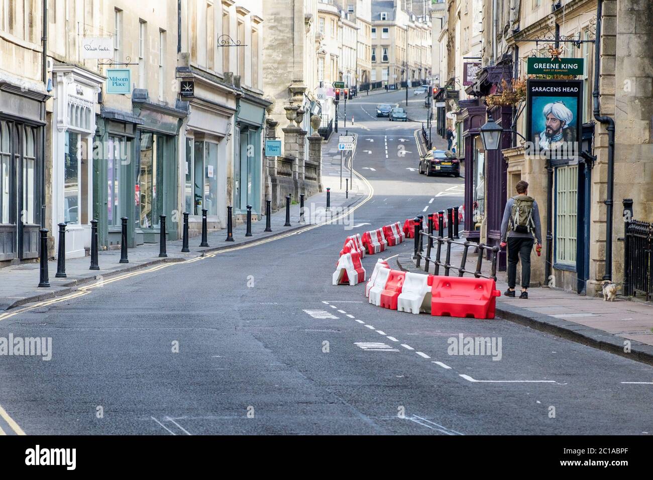 Bath, UK. 15th June, 2020. As non essential shops in England are given the green light by the government to reopen, street barriers put in place by the local council to widen the pavements in order to help with social distancing are pictured in Broad street. Credit: Lynchpics/Alamy Live News Stock Photo