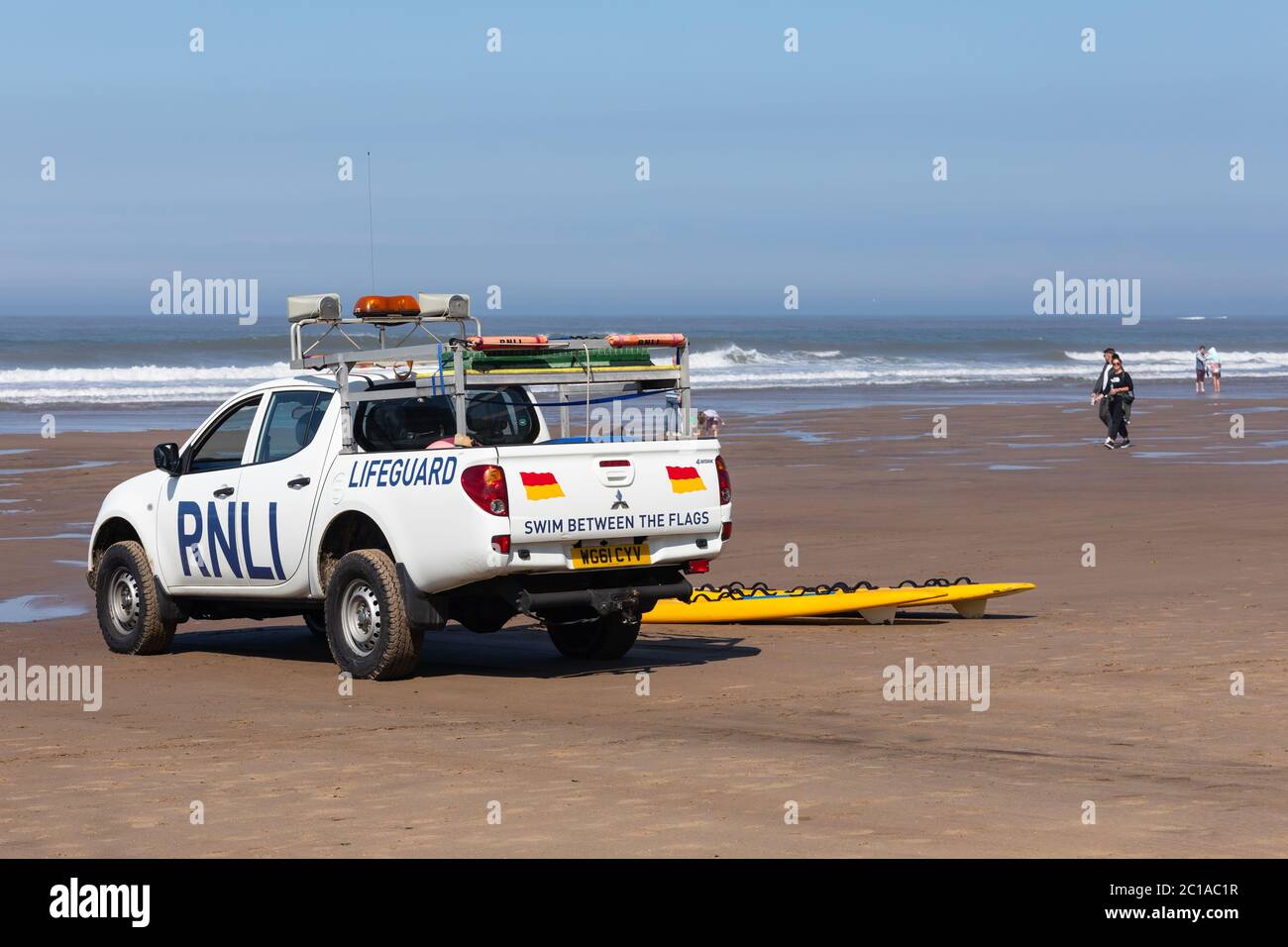 The RNLI patrolling the beach at Whitby, England. Stock Photo