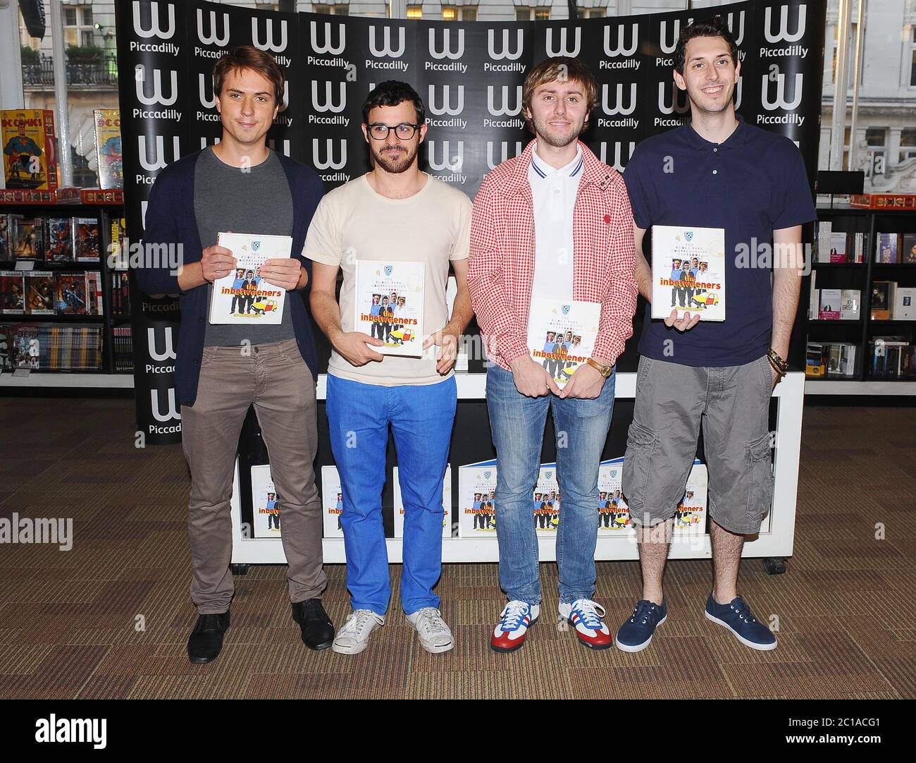 Joe Thomas, Simon Bird, James Buckley and Blake Harrison sign copies of The Inbetweeners Yearbook at Waterstones Piccadilly. © Paul Treadway Stock Photo