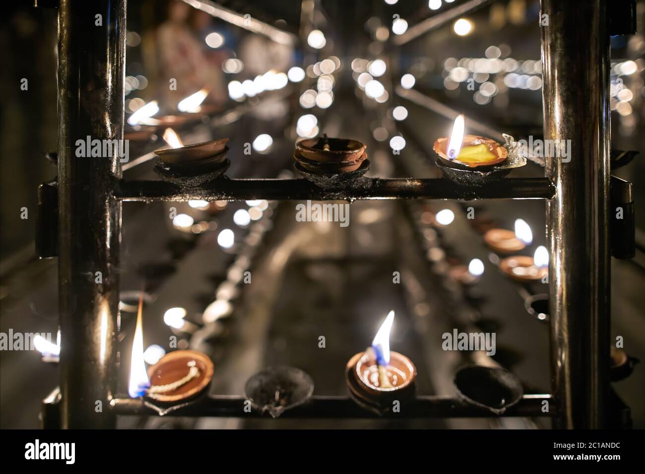 Oil lamp with woman inside outlet