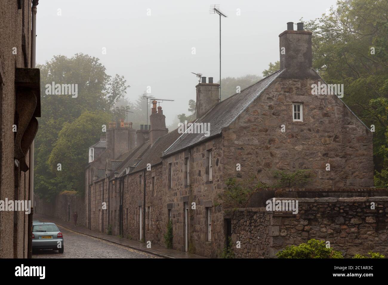 View of College Bounds in the University of Aberdeen in the fog, Scotland Stock Photo
