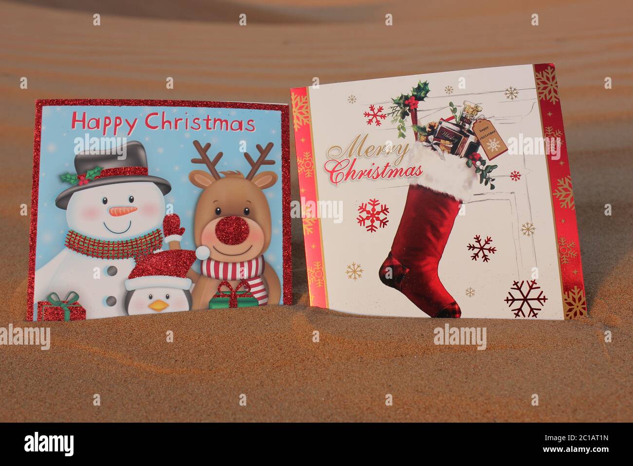 Christmas greeting cards in desert sand dune. Merry Christmas/Happy ...