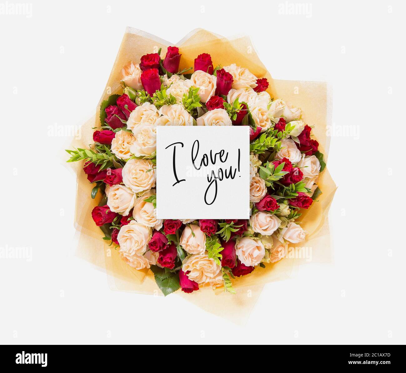 fresh flowers bunch and card with words i love you written