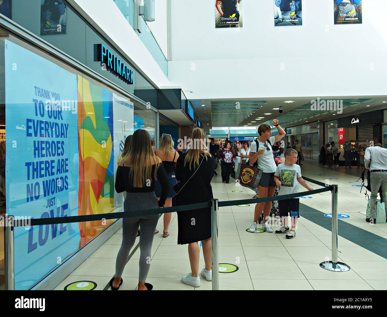 Primark  Queue  of  shoppers for entering the store in staines shopping centre in surrey Stock Photo