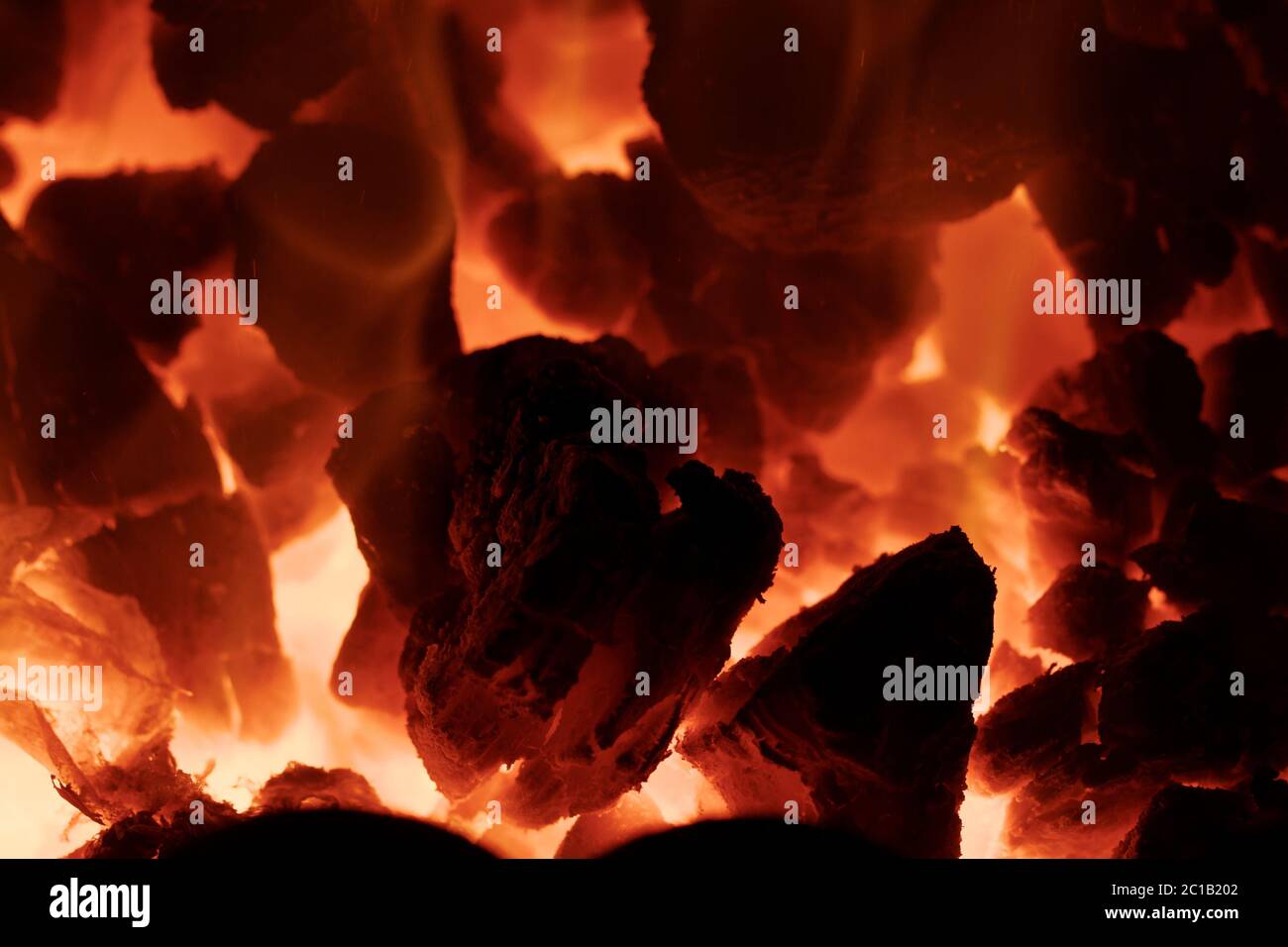 Fire flames with reflection on black background Stock Photo