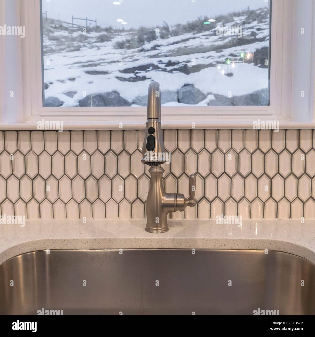 Square Stainless steel sink in a modern kitchen Stock Photo Alamy