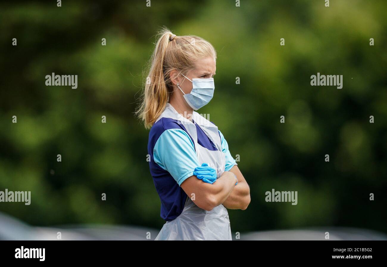 High Wycombe, UK. 15th June, 2020. Assistant Physiotherapist Aly Vogelzang in protective wear during week two of Wycombe Wanderers Football Club return to training following the decision to end the 2019/20 EFL League One season, due to the COVID-19 pandemic. Wycombe now prepare for a 2 leg Play-Off semi final versus Fleetwood Town in July. Wycombe Training Ground, High Wycombe, England on 15 June 2020. Photo by Andy Rowland. Credit: PRiME Media Images/Alamy Live News Stock Photo