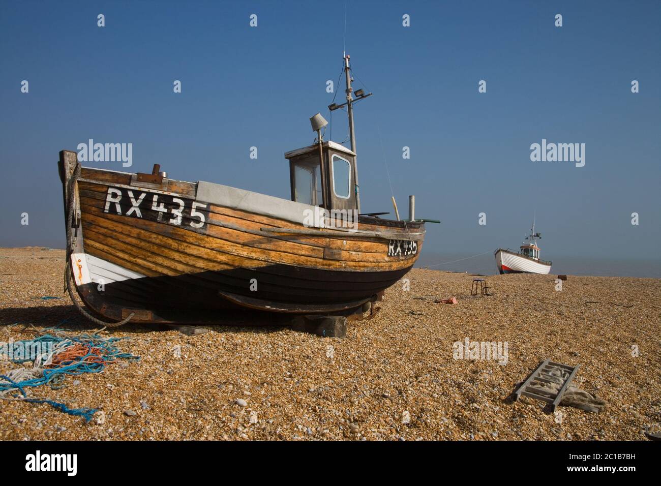 fishing boats at dungeness on the kent coast Stock Photo - Alamy