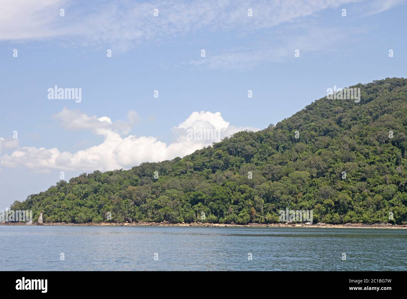 View of the Lokobe Strict Nature Reserve on Nosy Be Island from a boat Madagascar. Stock Photo