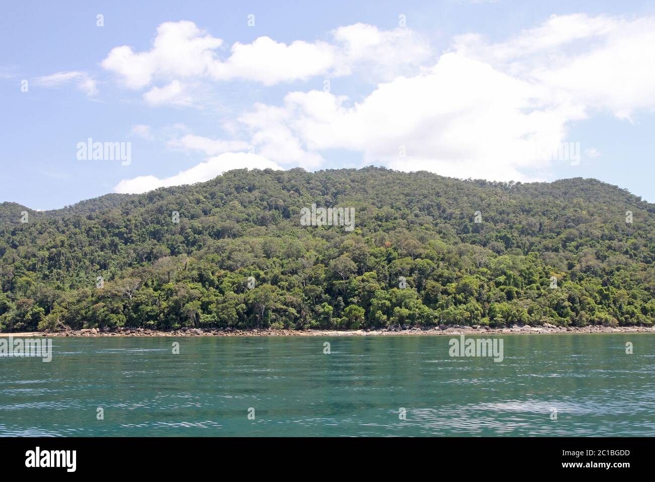 View of the Lokobe Strict Nature Reserve on Nosy Be Island from a boat Madagascar. Stock Photo