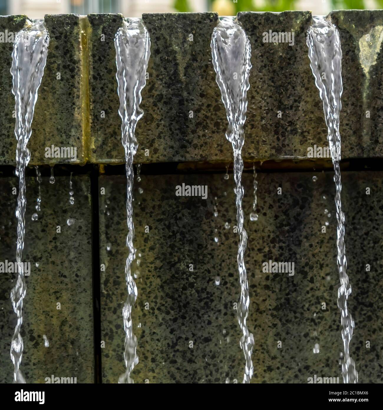 Square Crop Trickling Clear Water Of Fountain Close Up Outside Utah square-crop-trickling-clear-water-of-fountain-close-up-outside-utah