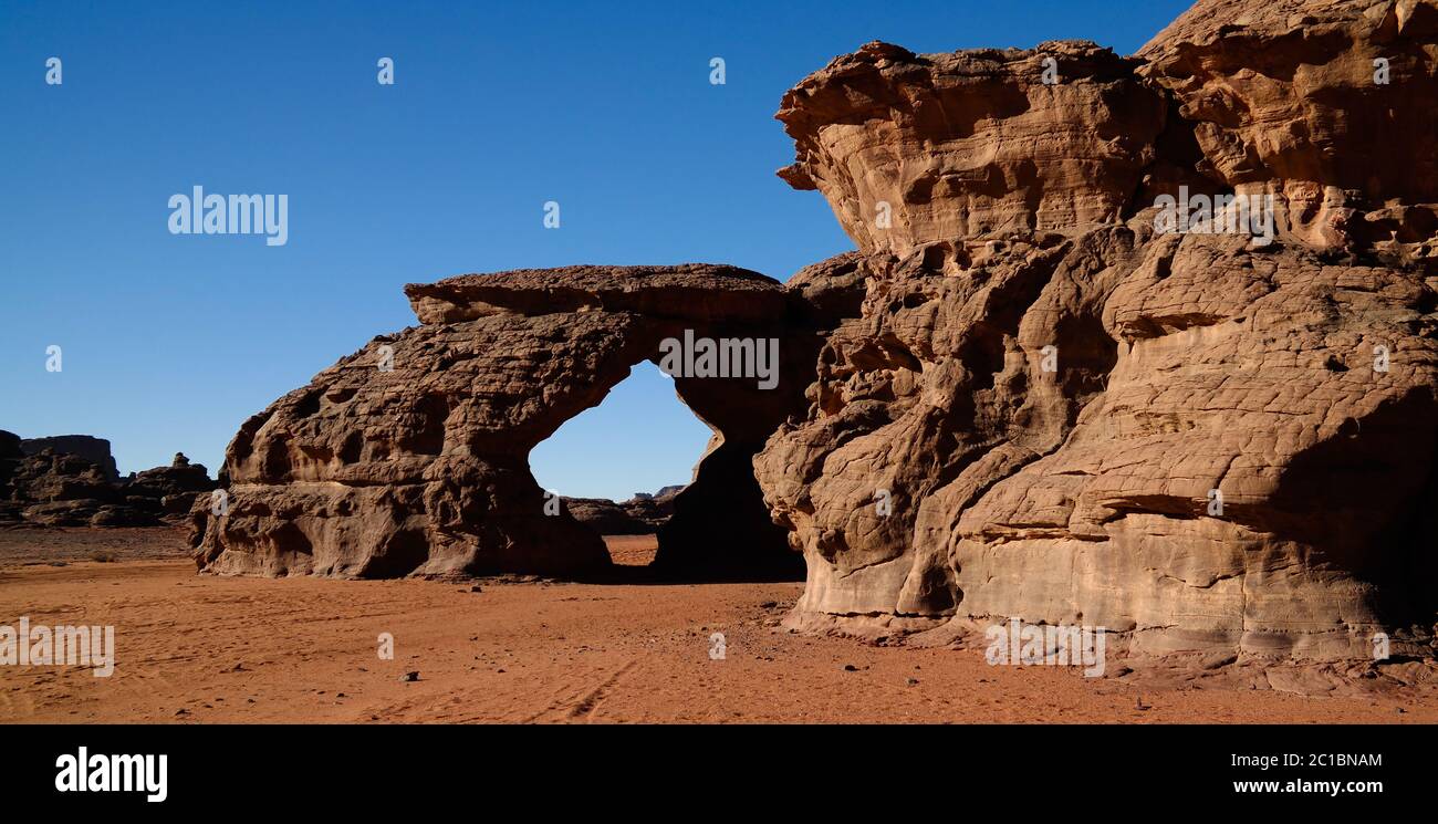Landscape of sand dune and sandstone nature sculpture at Tamezguida in Tassili nAjjer national park, Algeria Stock Photo
