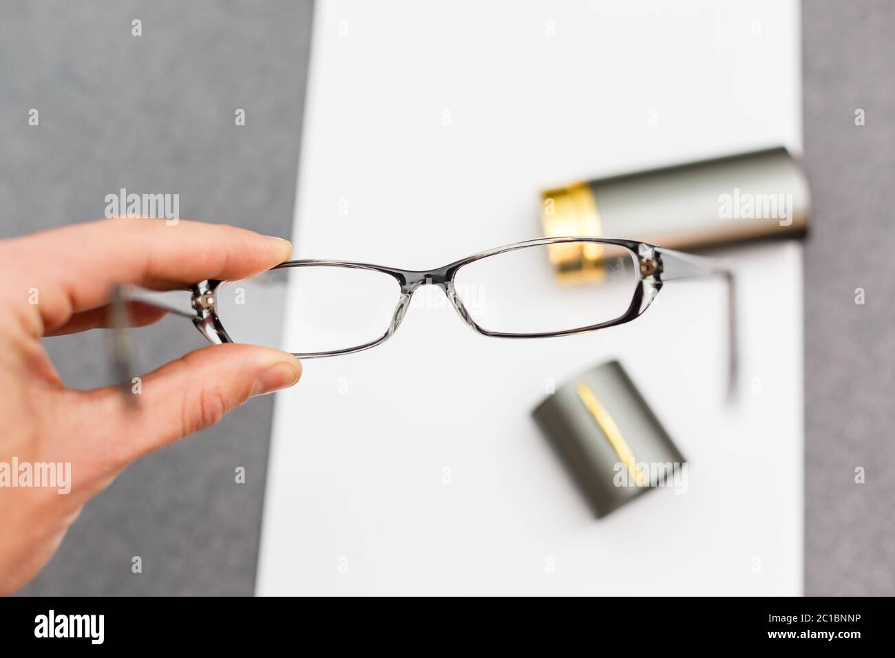 Magnifier, glasses and notebook paper Stock Photo Alamy
