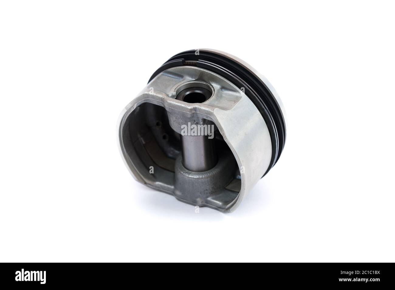 A closeup piston of an internal combustion engine with piston rings