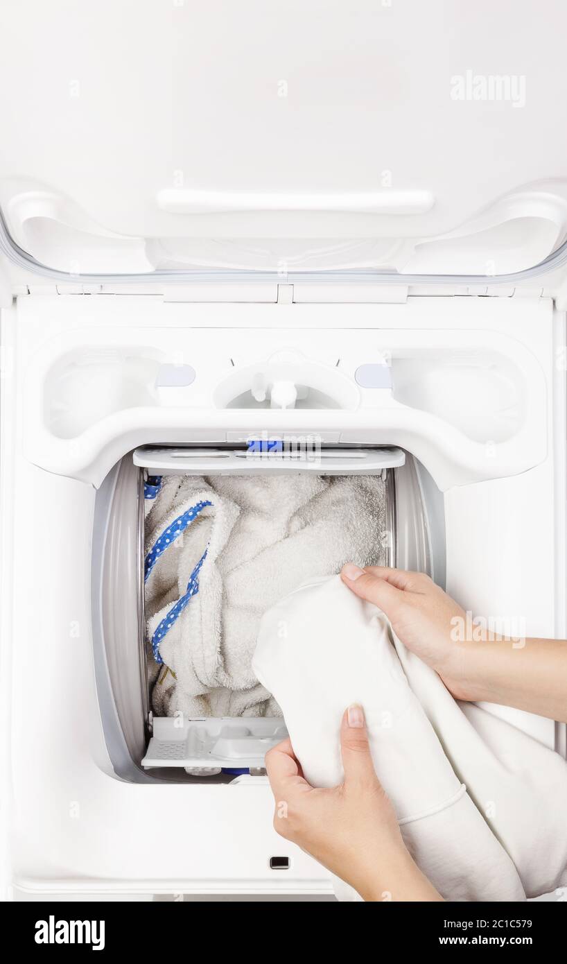 Washing machine loading Stock Photo Alamy