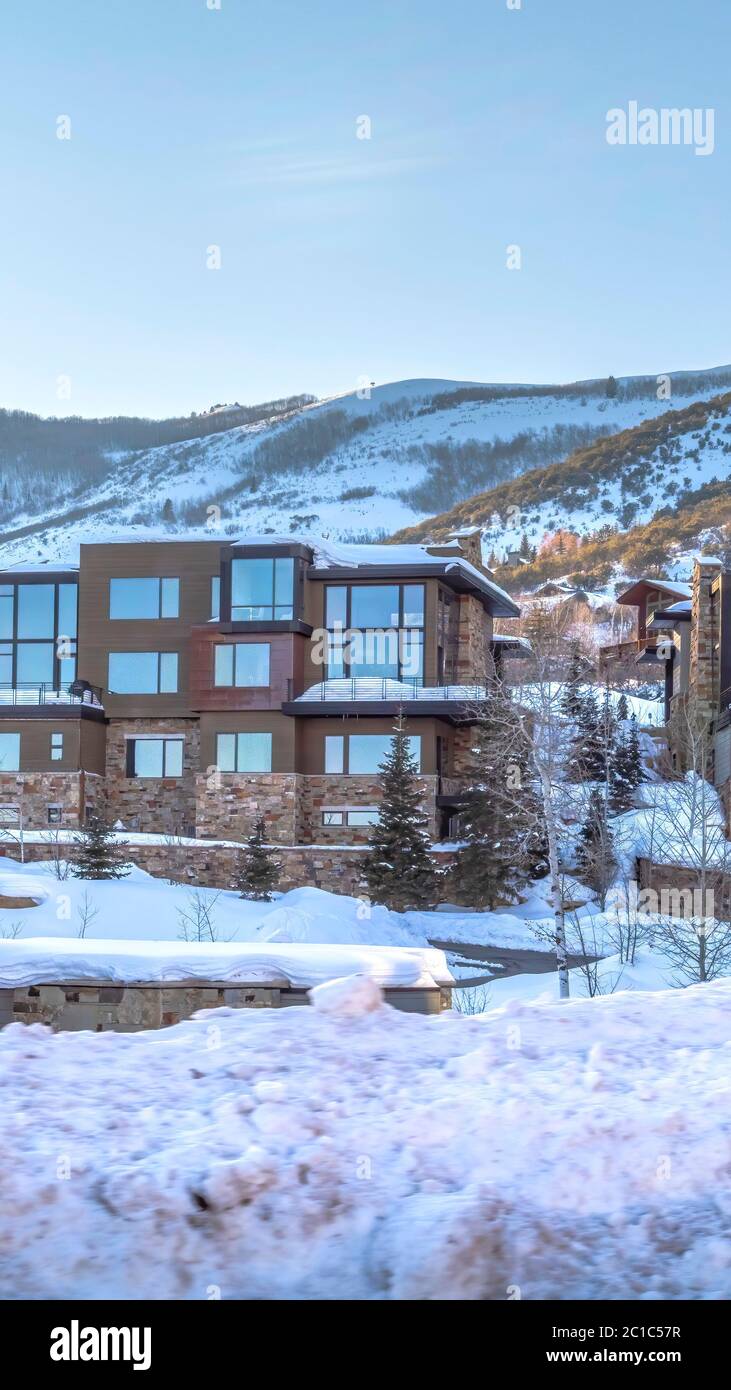 Vertical crop Modern homes in Park City Utah situated on scenic ...