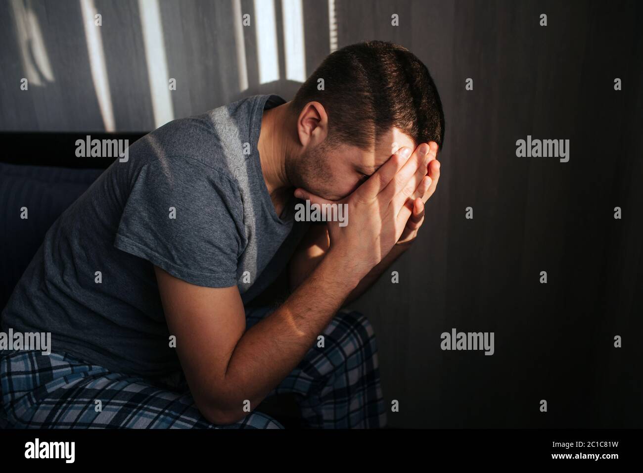 Impotence or prostatitis in a male model. Bad mood in the morning. Men's health problems. Impotence or prostatitis in a male model Stock Photo