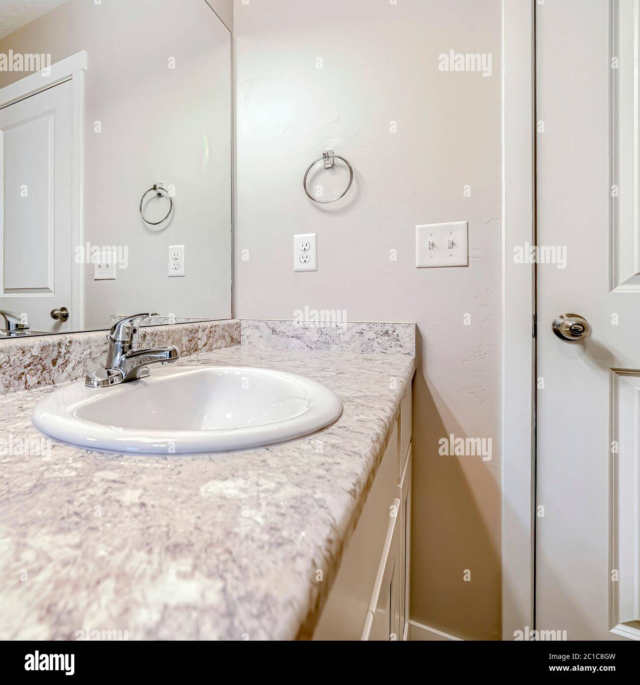 Square Top mount sink with stainless steel faucet on bathroom marble countertop Stock Photo Alamy