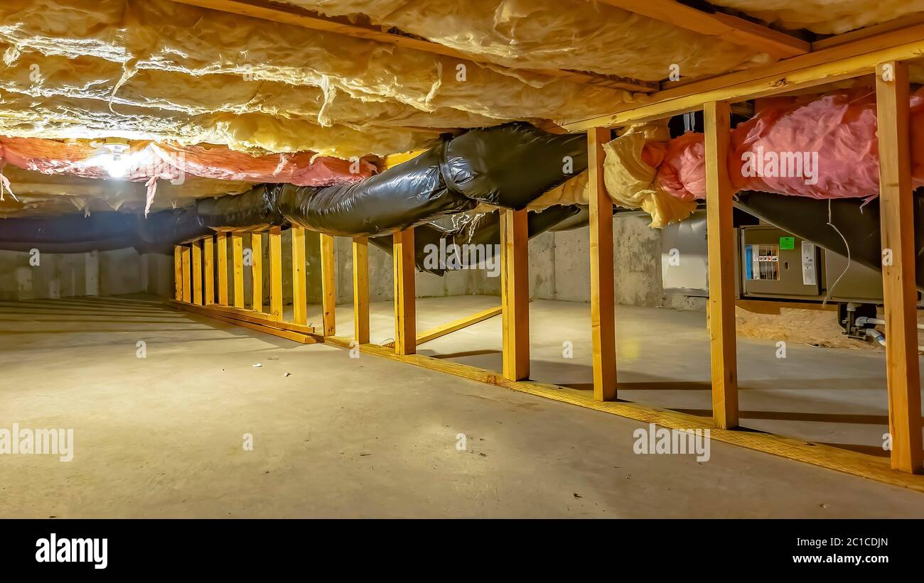 Panorama Basement or crawl space with upper floor insulation and wooden
