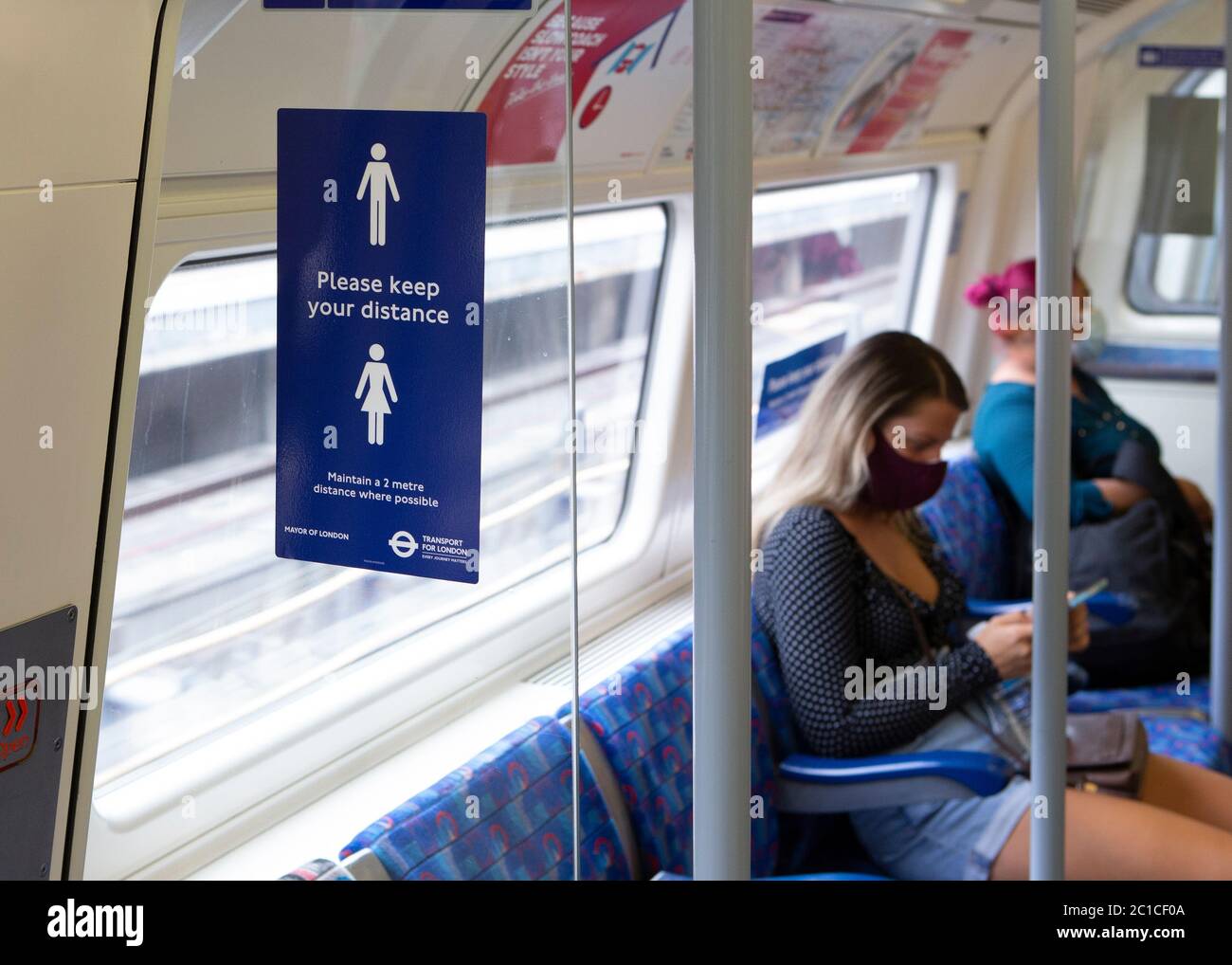 Face masks london underground sign hires stock photography and images