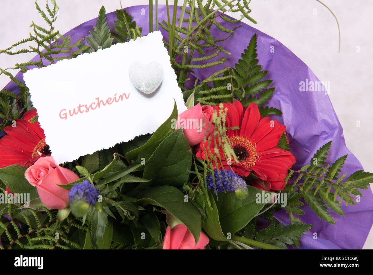 Flower bouquet with voucher Stock Photo