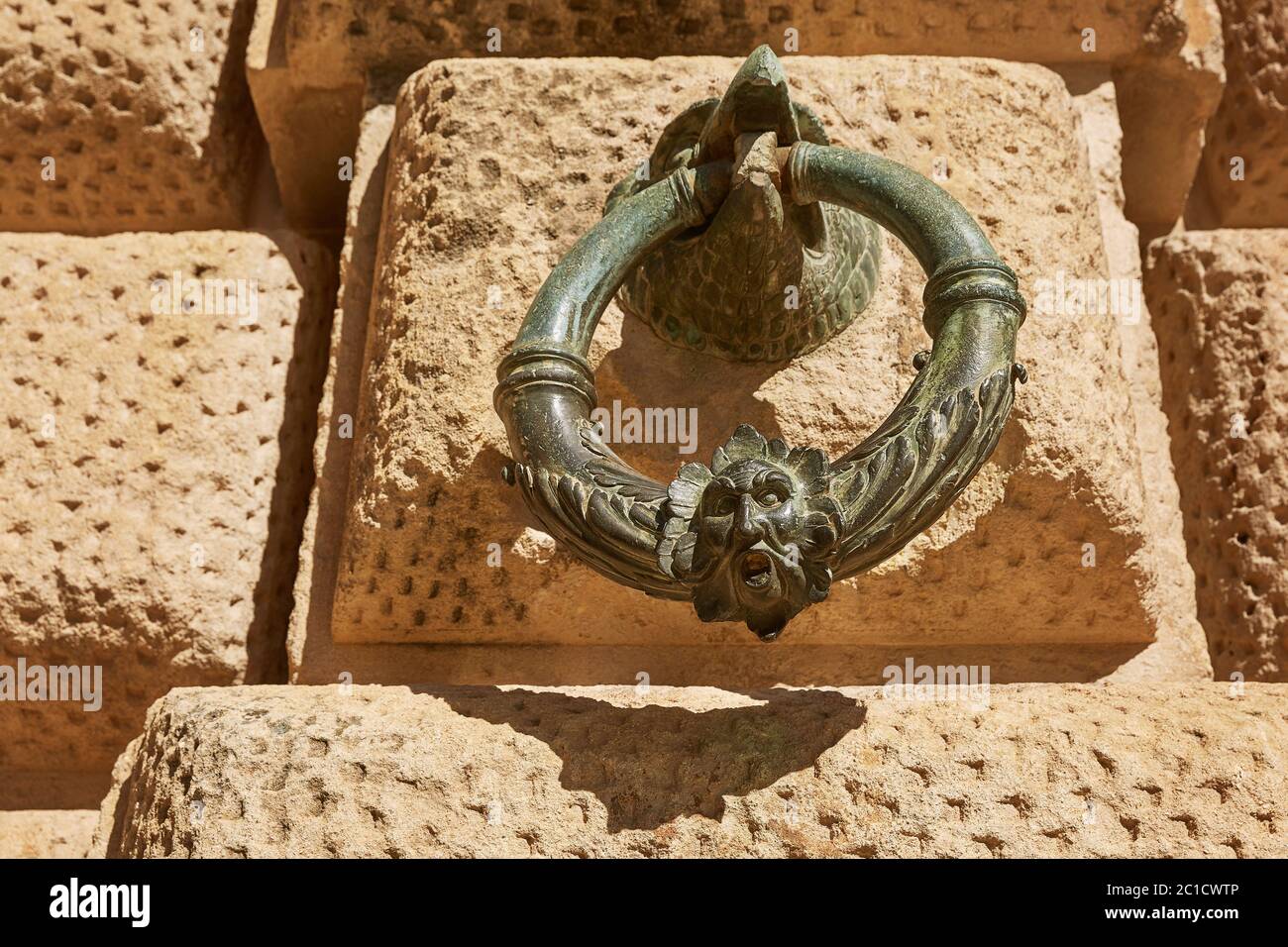 Decoration ring on the wall of Palacio de Carlos V in La Alhambra, Granada, Spain Stock Photo