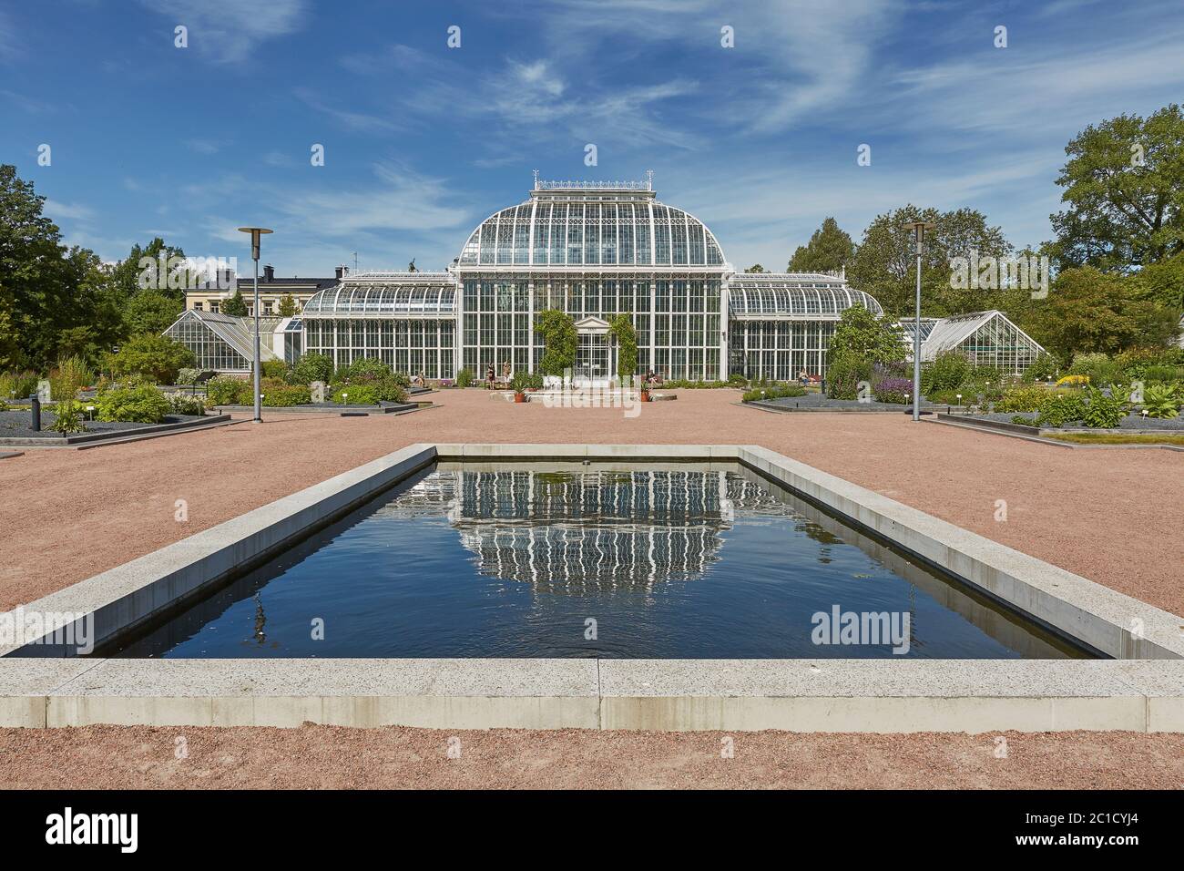 Greenhouse reflection and Kaisaniemi botanic garden in Helsinki Finland