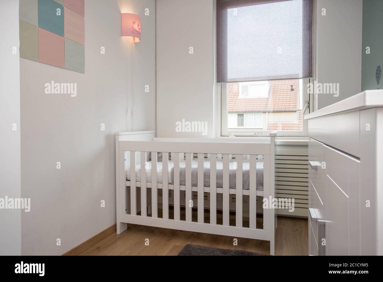 Interior of modern baby room simple white decoration Stock Photo