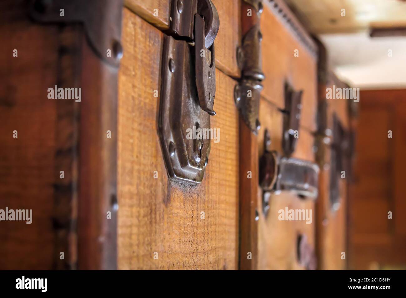 Closeup of an old leather travel suitcase with two snap locks Stock Photo