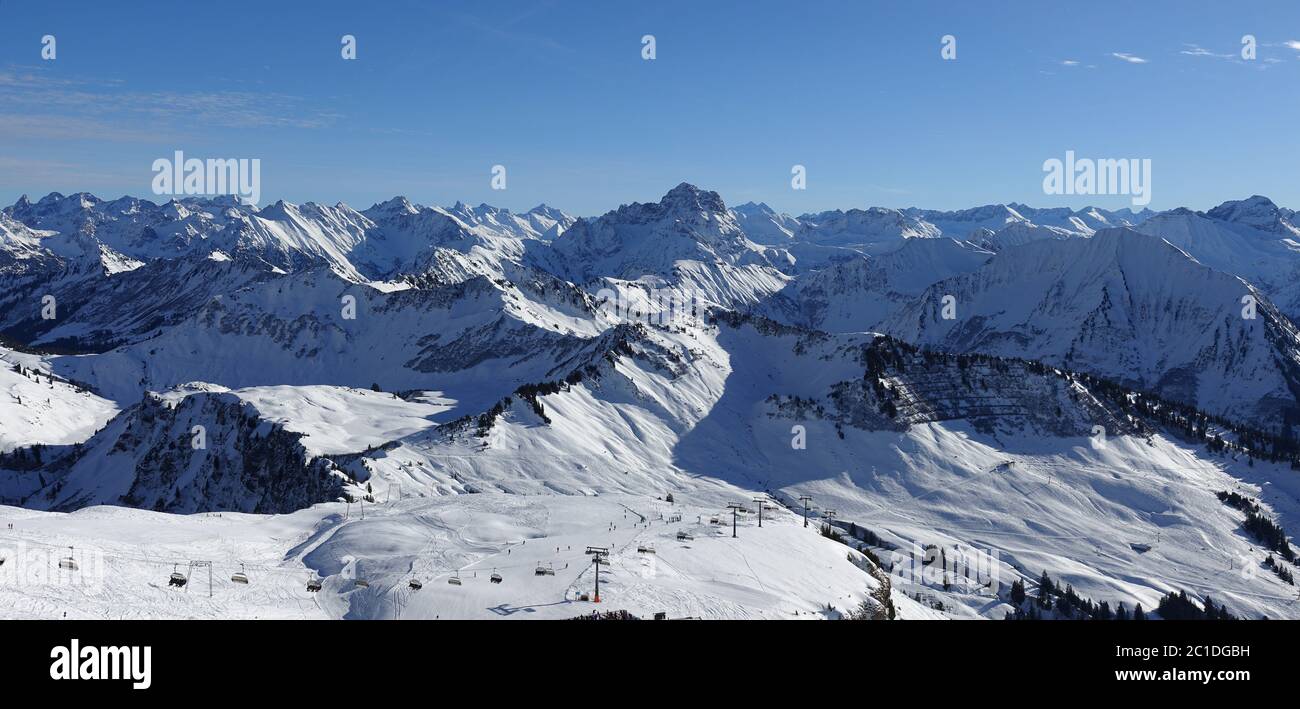 Ski slopes in the snowy mountains of the Bregenz Forest in Austria. Stock Photo