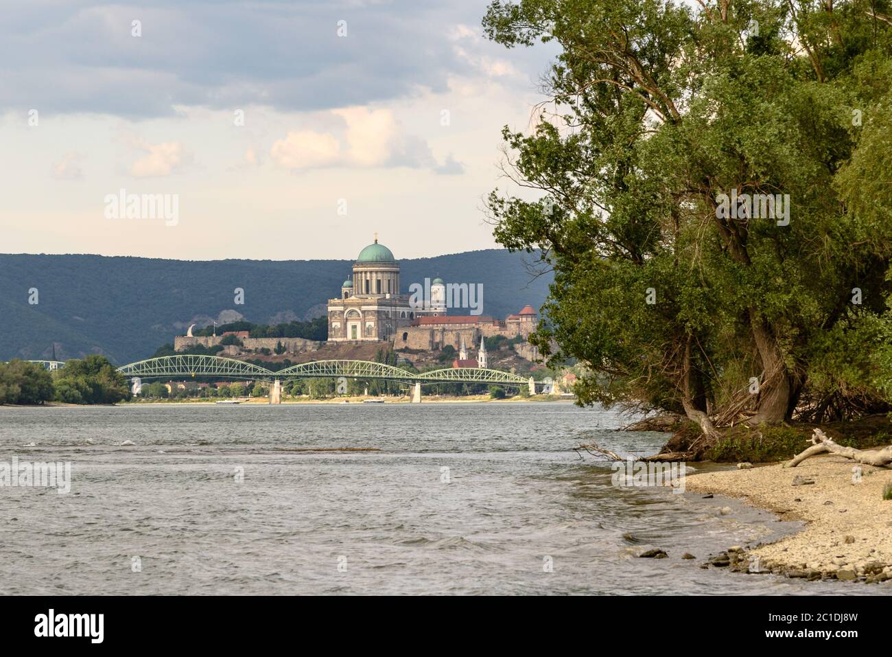 The Maria Valeria bridge spanning the Danube River with the Esztergom Basilica in the background Stock Photo