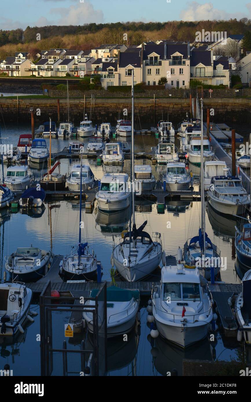 Late evening sky over boats in Welsh harbour Stock Photo