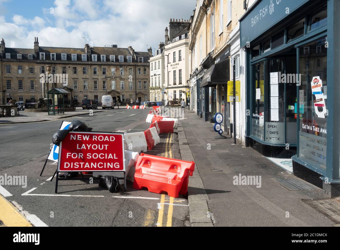Non essential shops reopen in Bath. Pavements widened in the City with street barriiers in place so social distancing measures can be met. Covid 19,UK Stock Photo