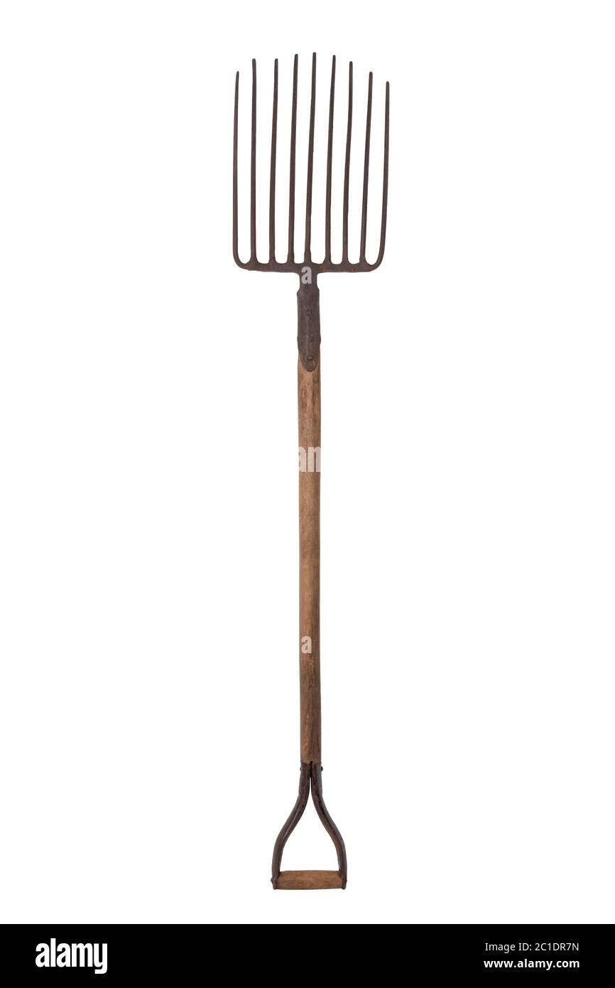 Vintage coal tools. An old heavy coal fork with which the briquettes