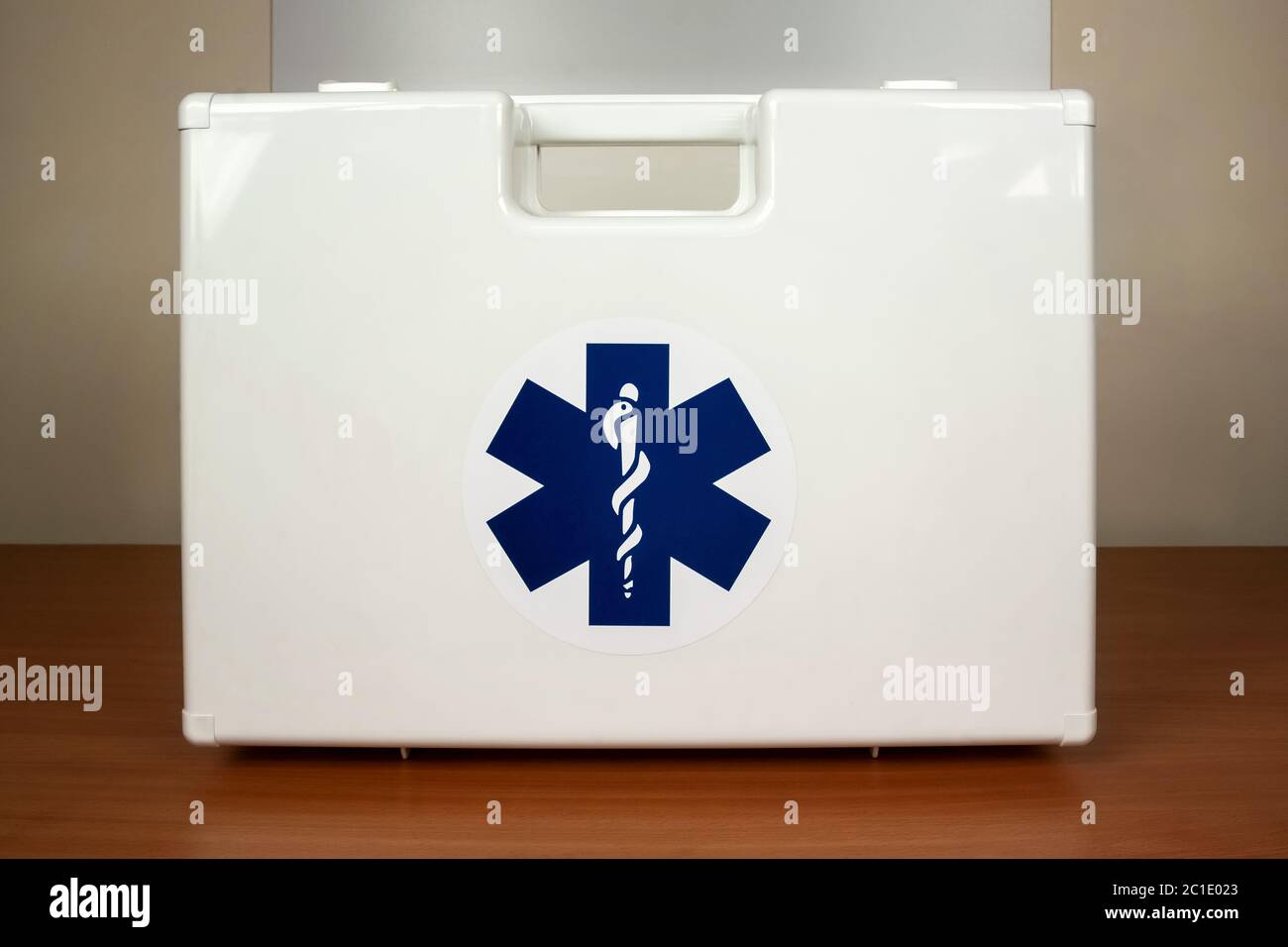 First aid kit, containing all the medical aids for a rapid emergency intervention. Portable transportable kit. Stock Photo