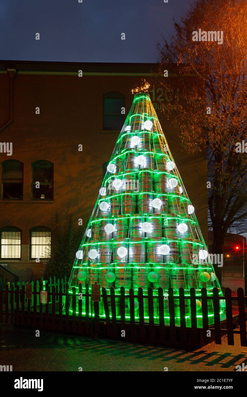WA16782-00...WASHINGTON - A seasonally decorated tree created by beer kegs at the Pyramid Brewing Company located in Seattle's Stadium District. Stock Photo