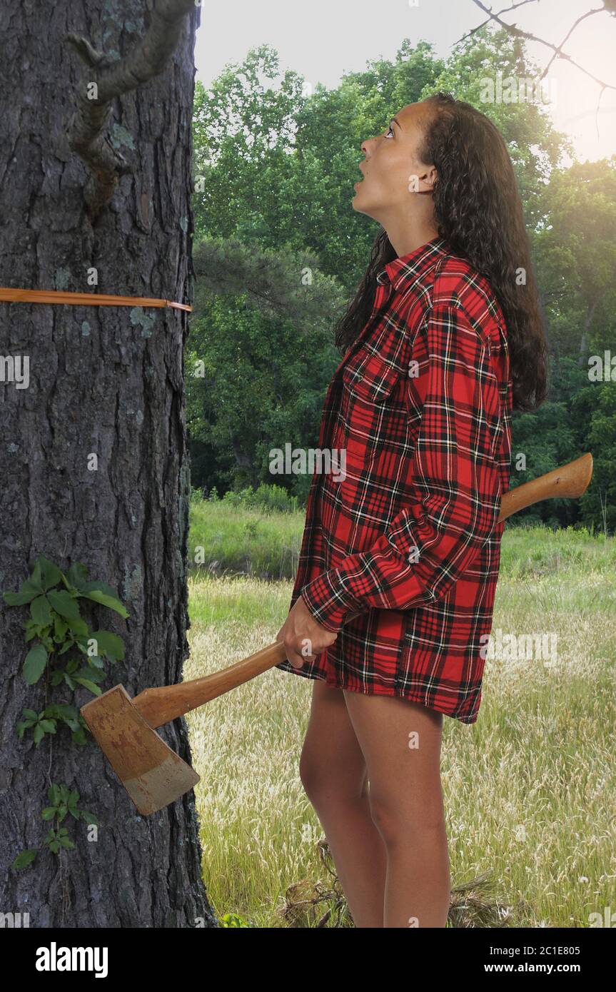 Woman Lumberjack with an axe Stock Photo
