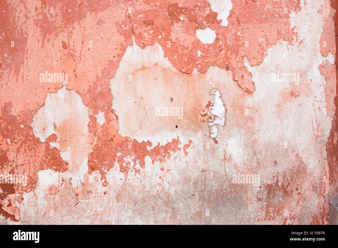 pink texture of an old wall. vintage background of dirty rough plaster Stock Photo