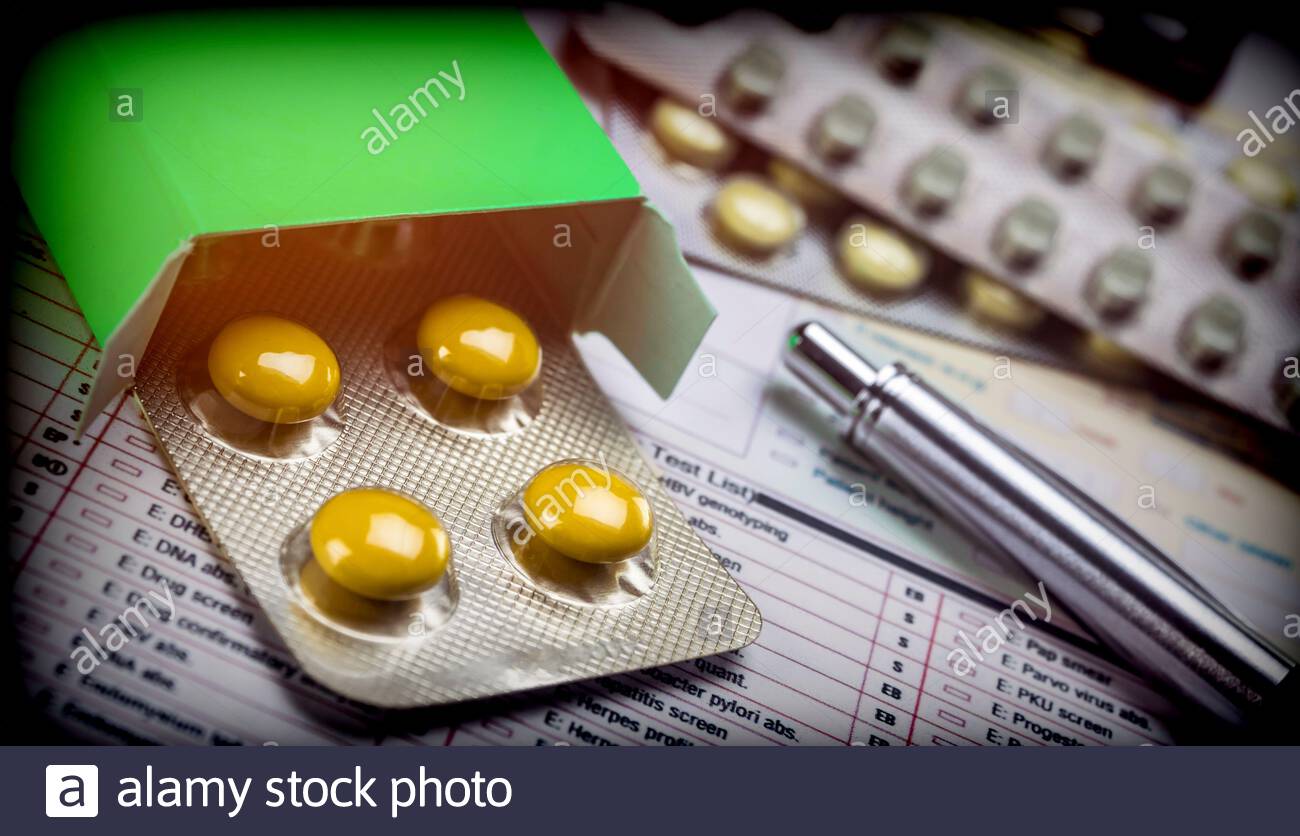 Download Blister Pack Of Pills Yellow And Green Box Next To A Form Conceptual Image Stock Photo Alamy PSD Mockup Templates