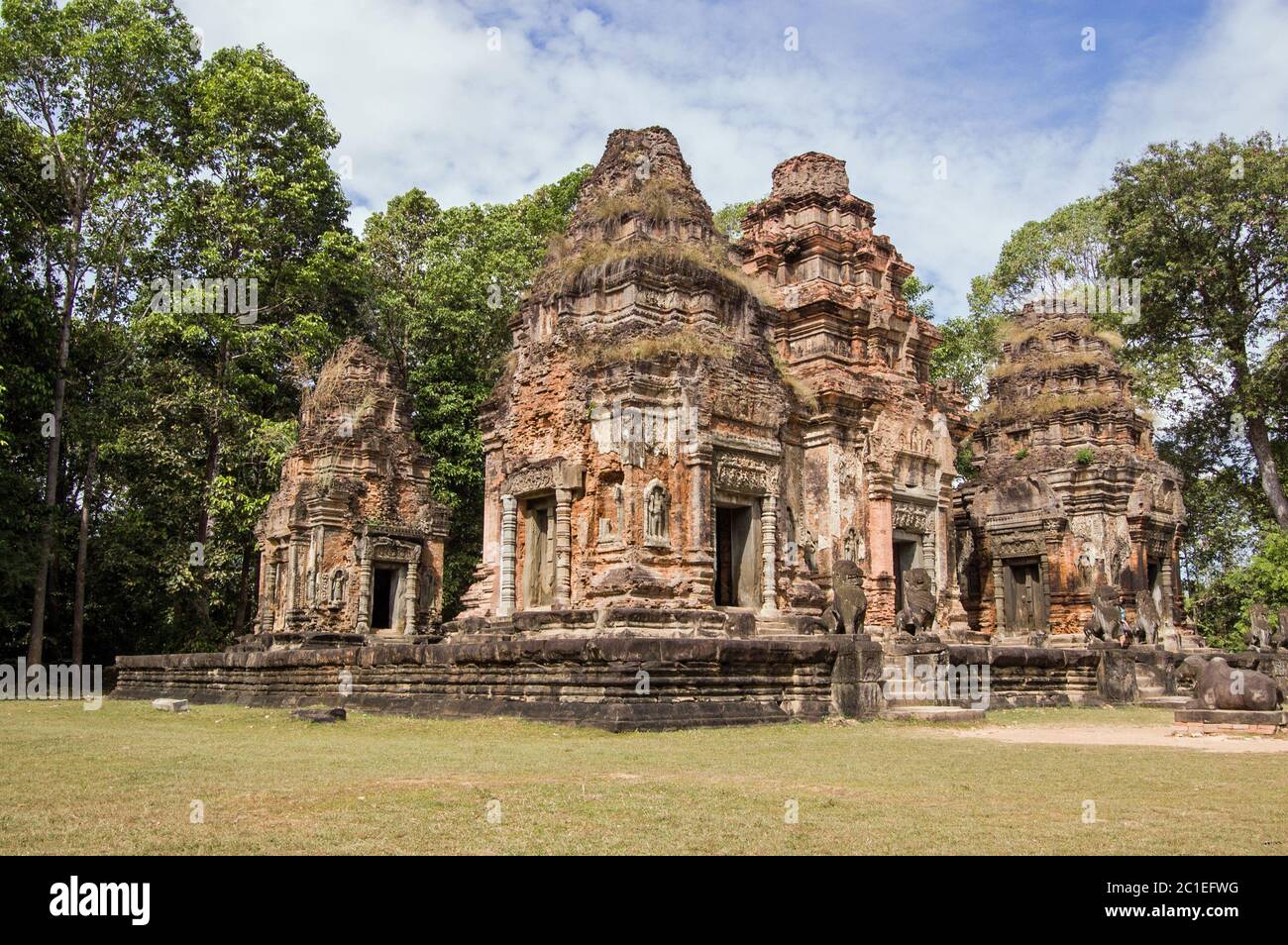 View of the ancient Khmer temple of Preah Ko, dedicated to the sacred bull. Part of the Roluos complex at Angkor, Cambodia. Stock Photo