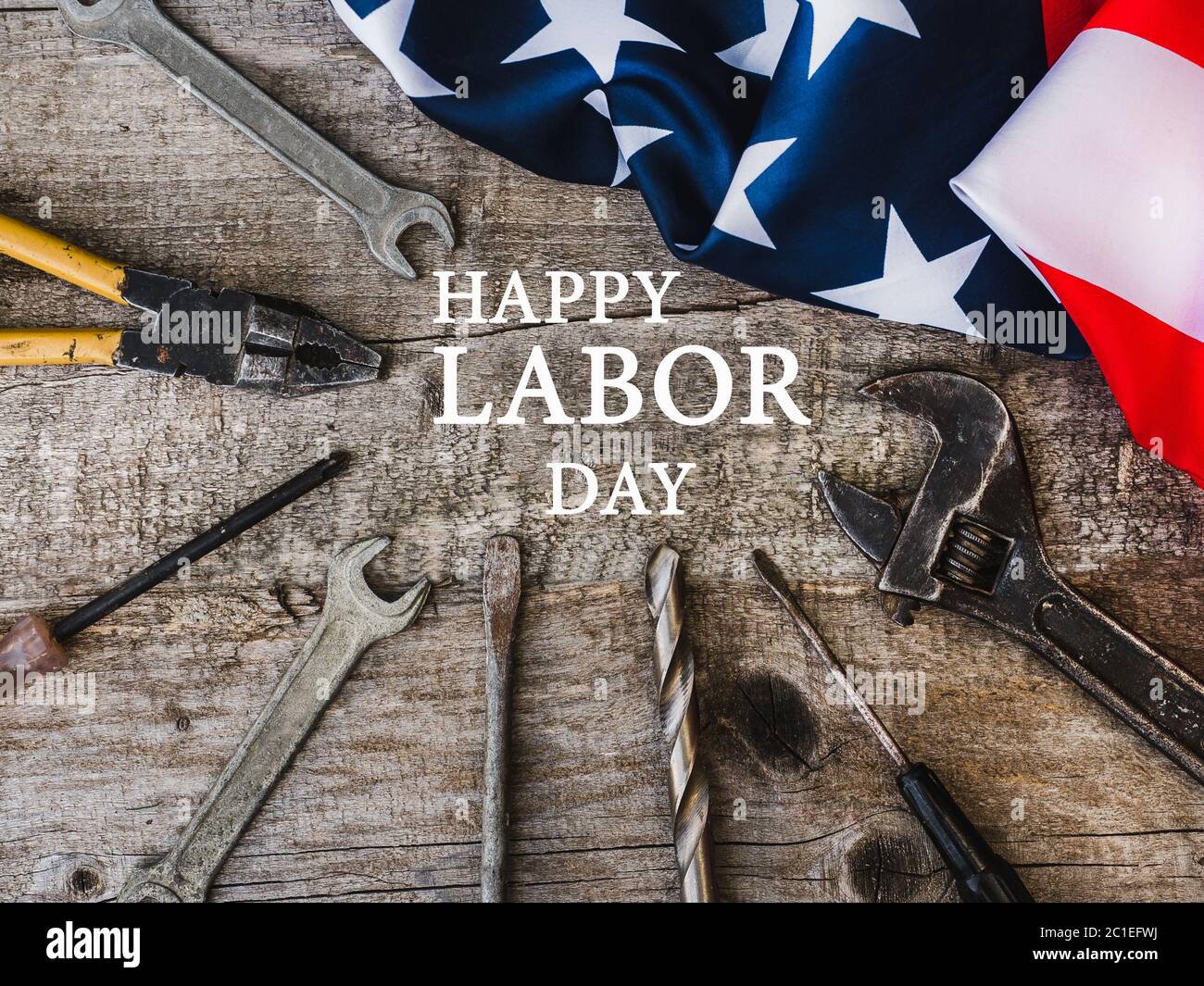 LABOR DAY. Hand tools lying on the table Stock Photo
