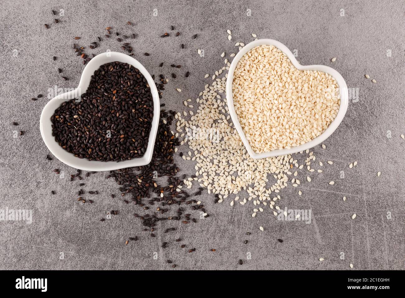 Black and white sesame seeds Stock Photo - Alamy