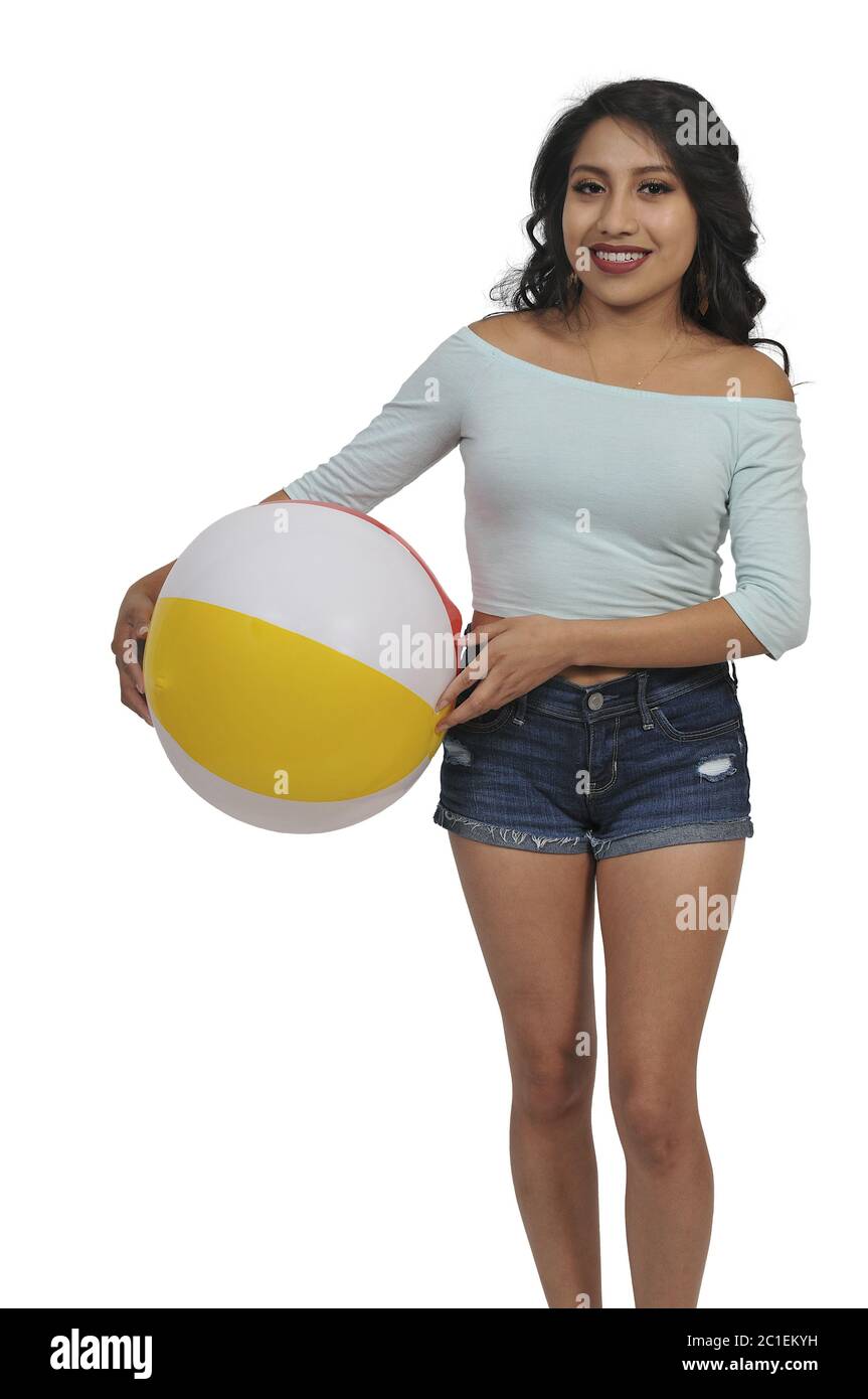 Woman Holding Beach Ball Stock Photo