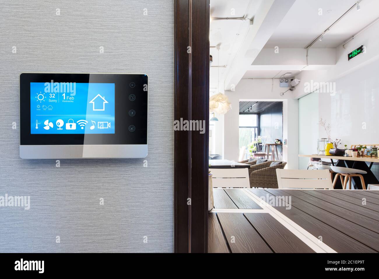 smart home app in control panel in modern restaurant Stock Photo