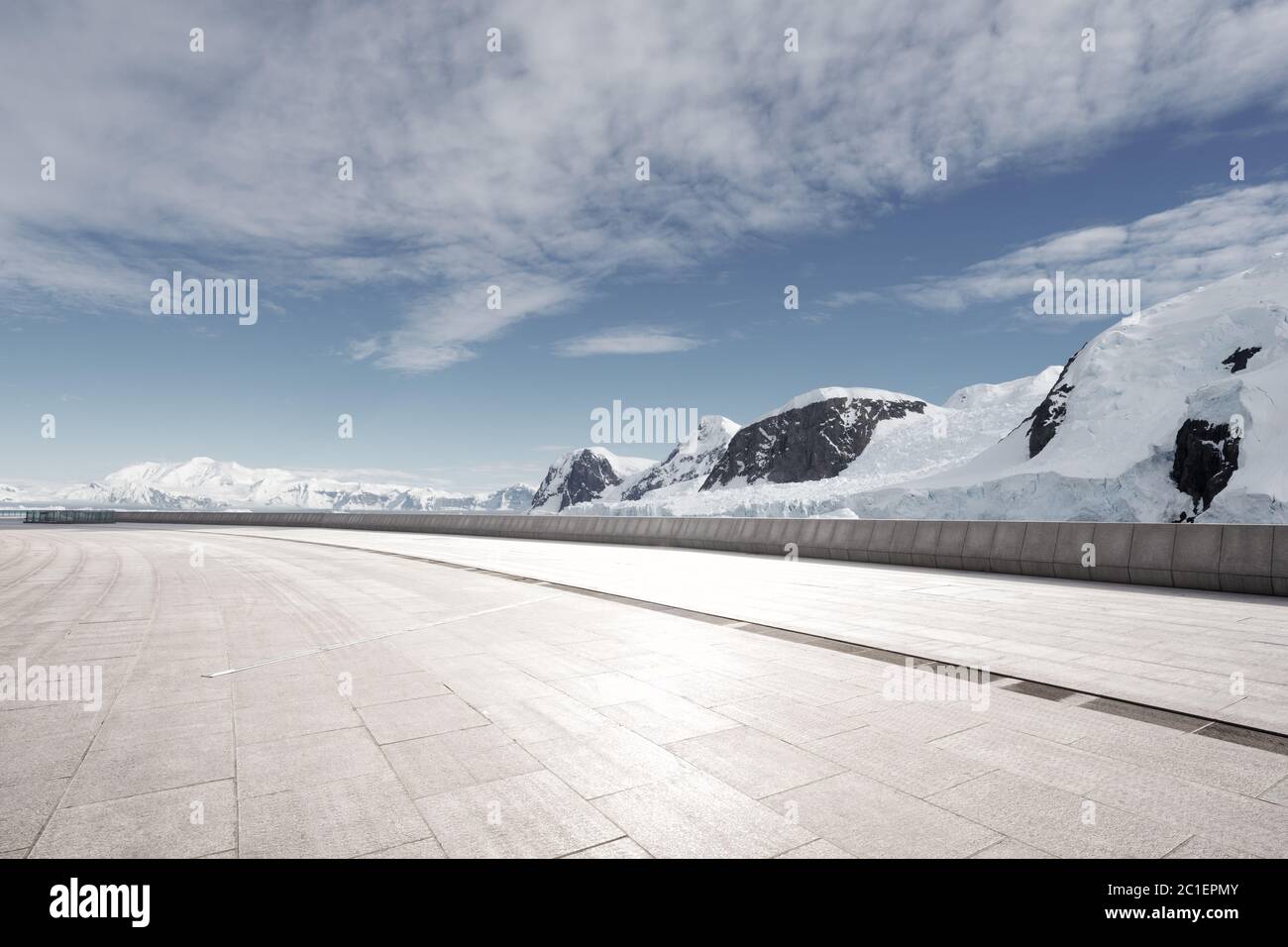 empty brick ground with sonw mountain as background Stock Photo