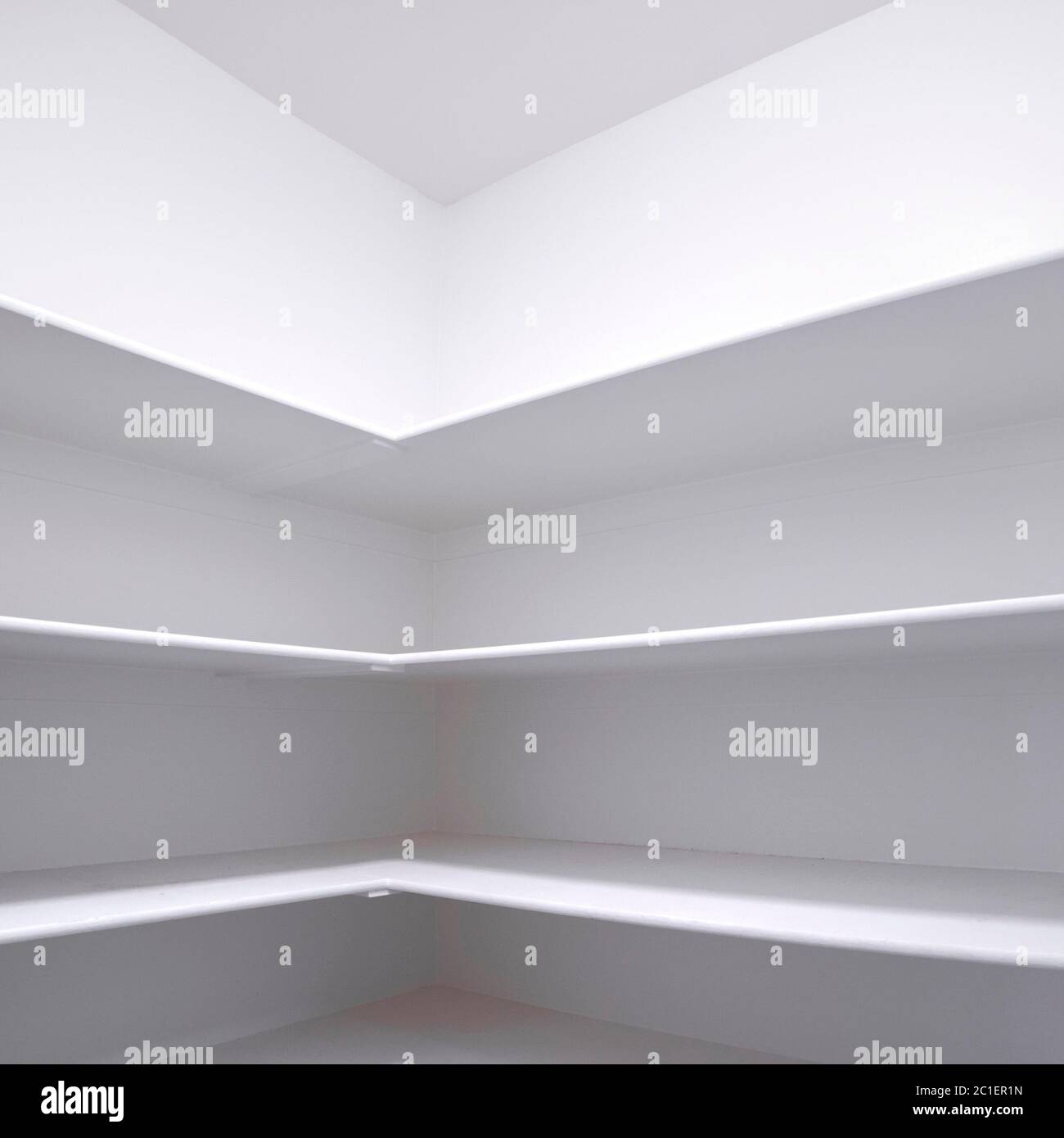 Square frame Empty white fitted shelves in an interior room Stock Photo