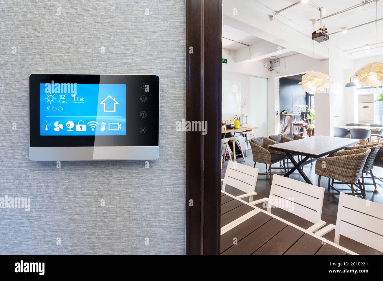 smart home app in control panel in modern restaurant Stock Photo