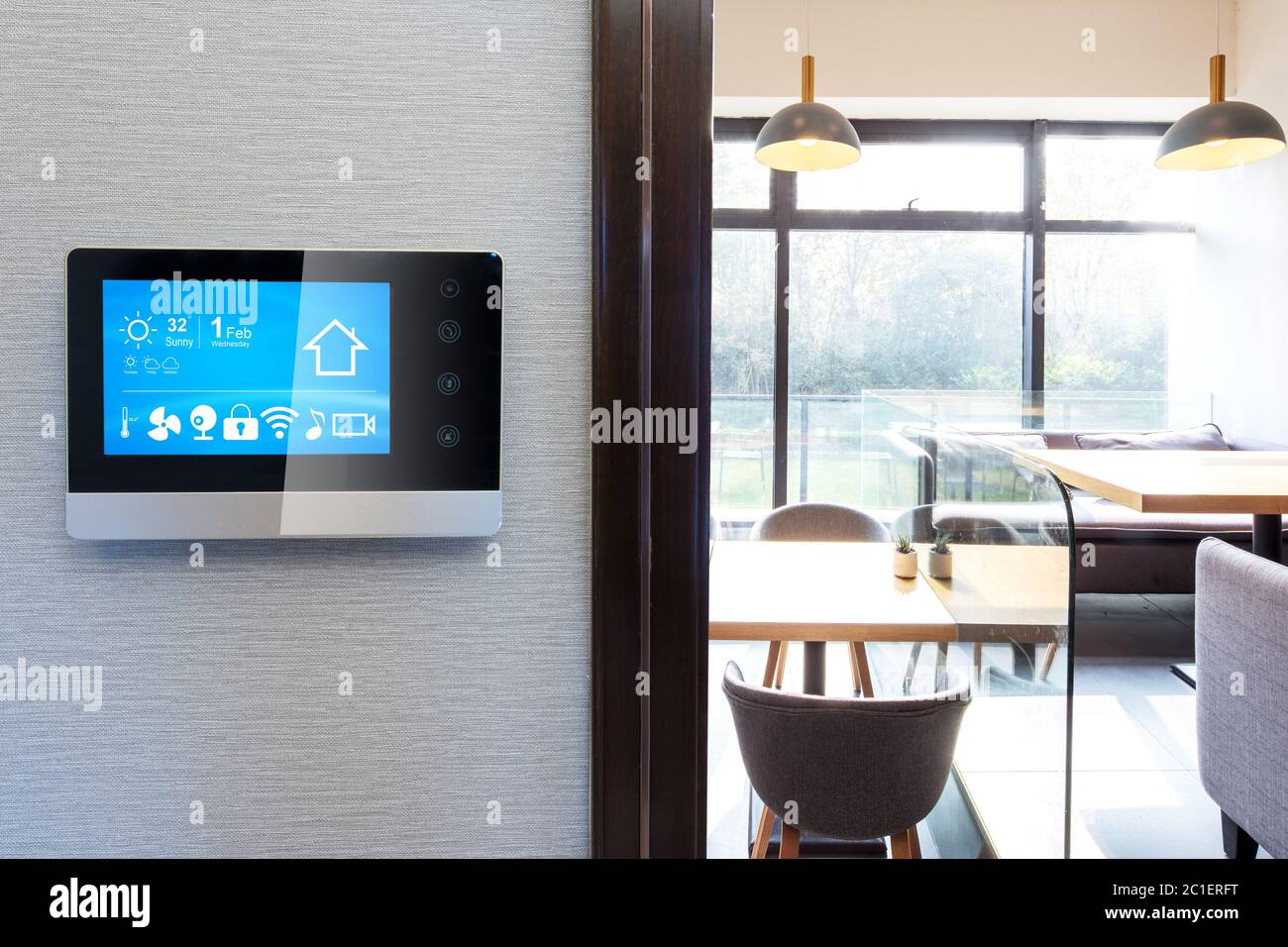 smart home app in control panel in modern restaurant Stock Photo