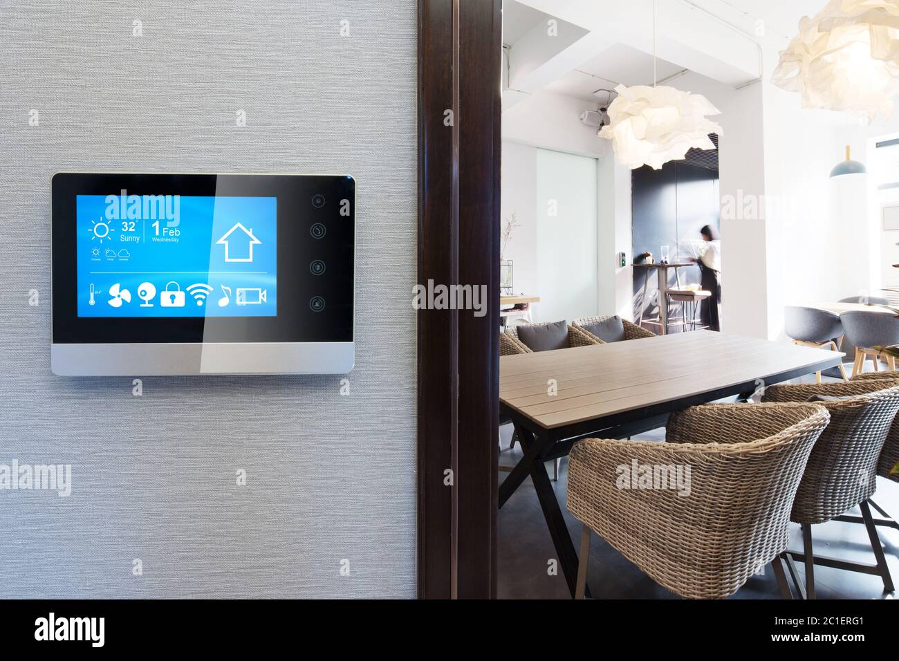 smart home app in control panel in modern restaurant Stock Photo