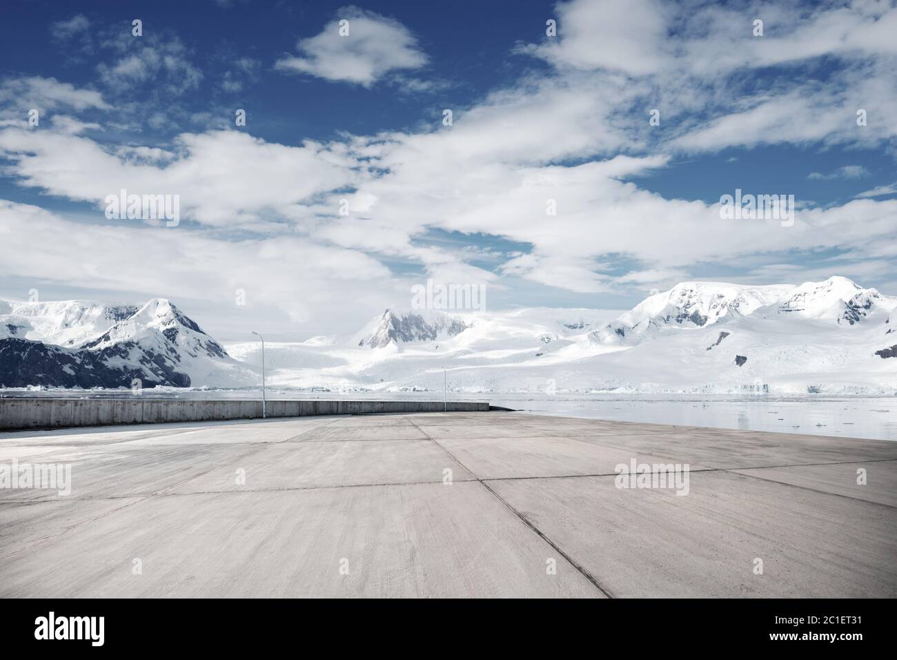 empty brick ground with sonw mountain as background Stock Photo